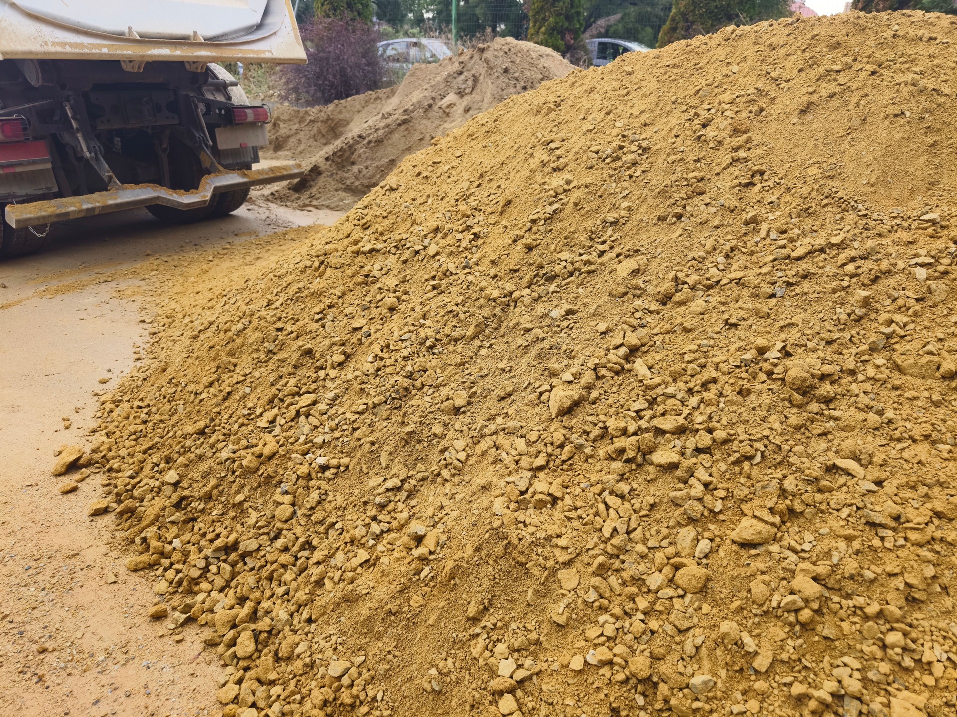 Dump truck unloading gravel